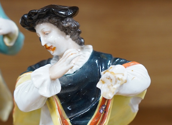 A Ludwigsburg porcelain figure and a pair of Berlin figures, tallest 27cm. Condition - poor